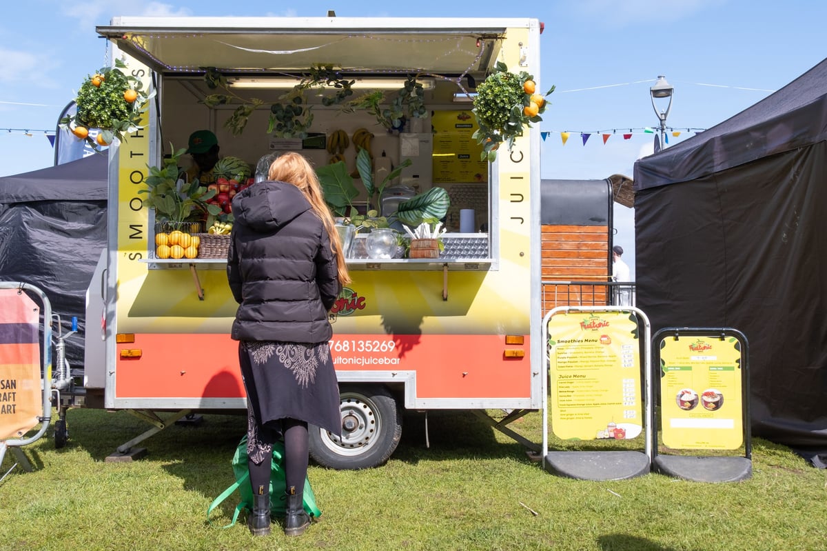 Woman waiting at juice bar